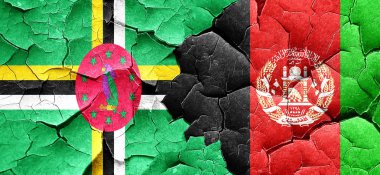 Dominika bayrak bir grunge Afganistan bayrağı ile duvar kırık