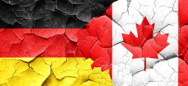 Bir grunge Kanada bayrağı ile Alman bayrağı duvar kırık