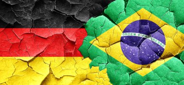 Bir grunge Brezilya bayrağı ile Alman bayrağı duvar kırık