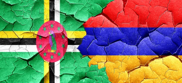 Bandera de Dominica con bandera de Armenia en una pared agrietada grunge —  Fotos de Stock
