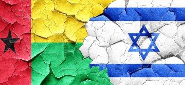 Gine bissau bayrak bir grunge İsrail bayrağı ile duvar kırık