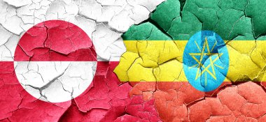 Grönland bayrak bir grunge Etiyopya bayrağı ile duvar kırık