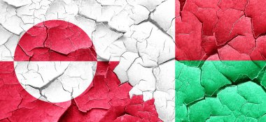 Grönland bayrak bir grunge Madagaskar bayrağı ile duvar kırık