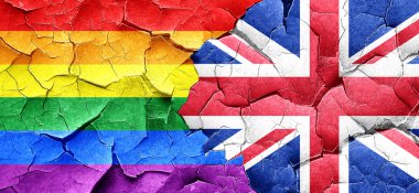 Eşcinsel gurur bayrak bir grunge Büyük Britanya bayrağı ile duvar kırık