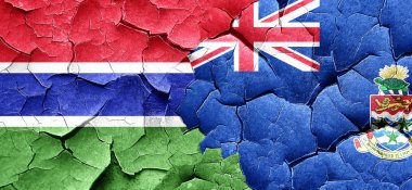 Gambiya bayrak bir grunge Cayman Adaları bayrağı ile duvar kırık