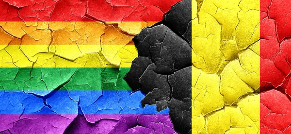 Gay pride flag with Belgium flag on a grunge cracked wall — Stock Photo, Image