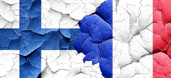 Flaga Finlandia Francja Flaga na grunge popękane ściany — Zdjęcie stockowe