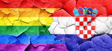 Eşcinsel gurur bayrak bir grunge Hırvatistan bayrağı ile duvar kırık