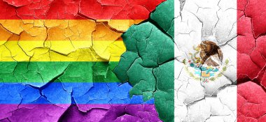 Eşcinsel gurur bayrak bir grunge Meksika bayrağı ile duvar kırık