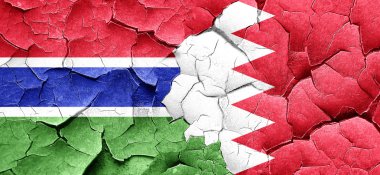 Gambiya bayrak bir grunge Bahreyn bayrağı ile duvar kırık