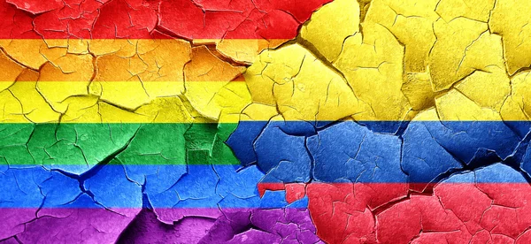 Gay pride flag with Colombia flag on a grunge cracked wall — Stock Photo, Image