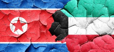 Kuzey Kore bayrağı bir grunge Kuveyt bayrağı ile duvar kırık