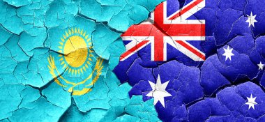 Kazakistan bayrağı bir grunge Avustralya bayrağı ile duvar kırık