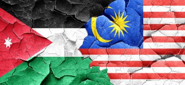 Jordan bayrak bir grunge Malezya bayrağı ile duvar kırık