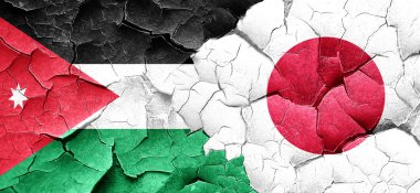 Jordan bayrak bir grunge Japonya bayrağı ile duvar kırık