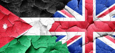 Jordan bayrak bir grunge Büyük Britanya bayrağı ile duvar kırık