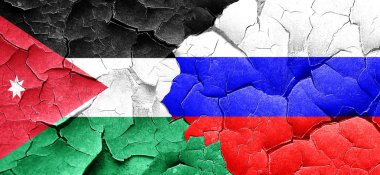 Jordan bayrak bir grunge Rusya bayrağı ile duvar kırık
