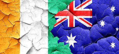 Fildişi Sahili bayrağı bir grunge Avustralya bayrağı ile duvar kırık