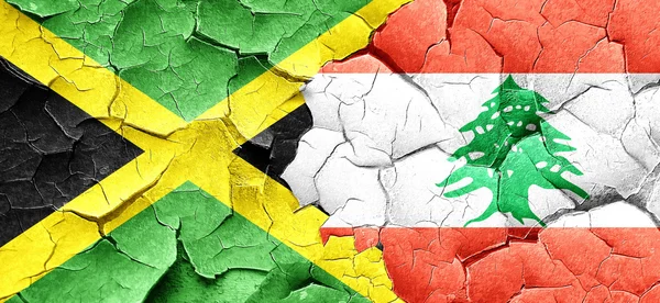 Jamaica vlajka s Libanonu vlajku grunge popraskané zdi — Stock fotografie