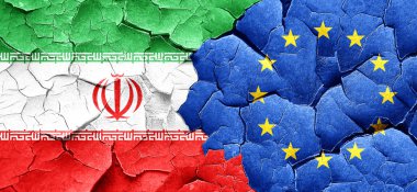 İran bayrağı bir grunge Avrupa Birliği bayrağı ile duvar kırık