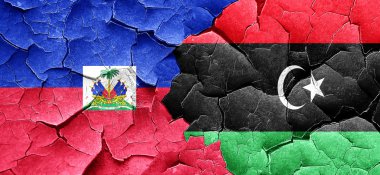 Haiti bayrak bir grunge Libya bayrağı ile duvar kırık