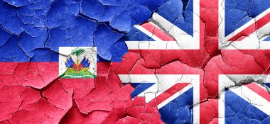 Haiti bayrak bir grunge Büyük Britanya bayrağı ile duvar kırık