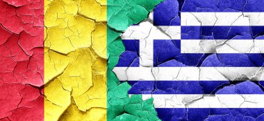 Gine bayrağı bir grunge Yunanistan bayrağı ile duvar kırık