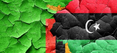 Zambiya bayrağı bir grunge Libya bayrağı ile duvar kırık