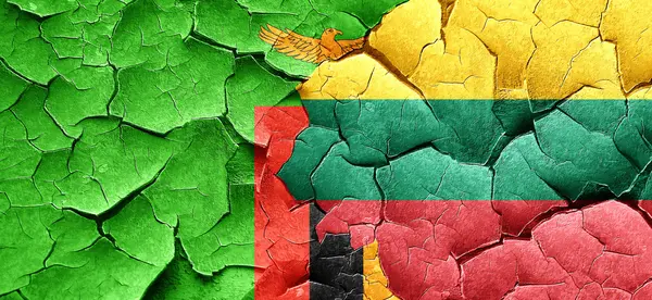 Zambia zászló a Litvánia lobogója alatt egy grunge-a fal repedt — Stock Fotó
