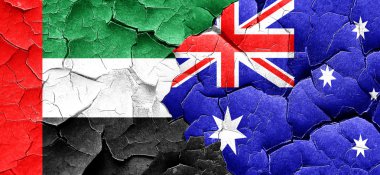 Birleşik Arap Emirlikleri bayrağı bir grunge Avustralya bayrağı ile duvar kırık