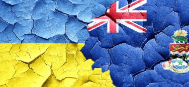 Ukrayna bayrağı bir grunge Cayman Adaları bayrağı ile duvar kırık