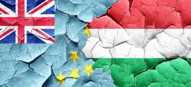 Tuvalu bayrağı bir grunge Macaristan bayrağı ile duvar kırık