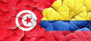 Tunus bayrağı bir grunge Kolombiya bayrağı ile duvar kırık