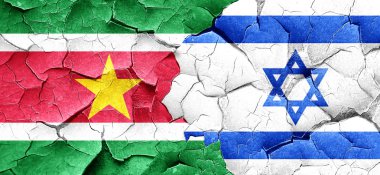 Surinam bayrak bir grunge İsrail bayrağı ile duvar kırık