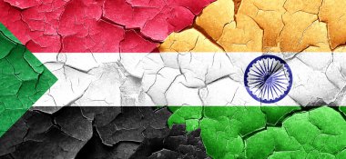 Sudan bayrağı bir grunge Hindistan bayrağı ile duvar kırık