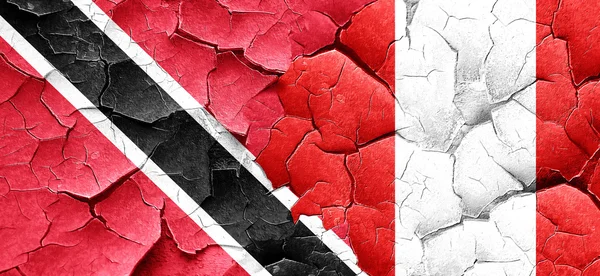 Trinidad and tobago flag with Peru flag on a grunge cracked wall — Stock Photo, Image