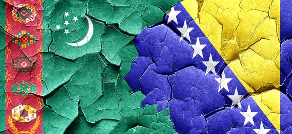 Bandeira do Turquemenistão com bandeira da Bósnia e Herzegovina em um grunge c — Fotografia de Stock