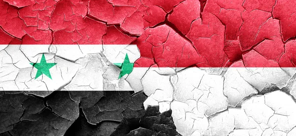 Syrien flagga med Indonesien flagga på en grunge knäckt vägg — Stockfoto