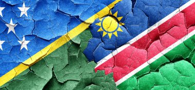 Solomon Adaları bayrağı bir grunge Namibya bayrağı ile duvar kırık