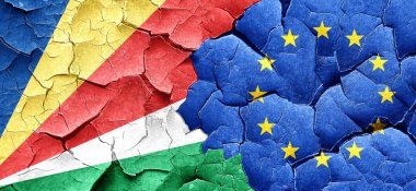 Seyşel Adaları bayrağı ile Avrupa Birliği bayrağı bir grunge üzerinde wal kırık