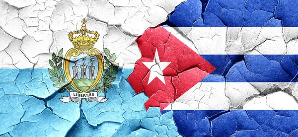 San marino flag with cuba flag on a grunge cracked wall — Stock Photo, Image