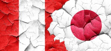 Peru bayrağı bir grunge Japonya bayrağı ile duvar kırık
