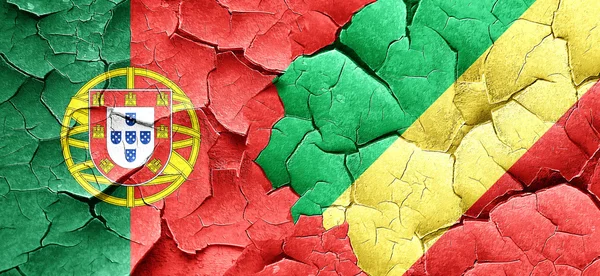 Bandera de Portugal con bandera de congo en una pared agrietada grunge —  Fotos de Stock