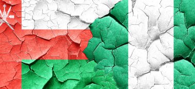 Umman bayrağı bir grunge Nijerya bayrağı ile duvar kırık
