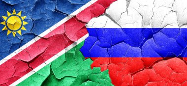 Namibya bayrak bir grunge Rusya bayrağı ile duvar kırık