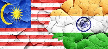 Malezya bayrağı bir grunge Hindistan bayrağı ile duvar kırık