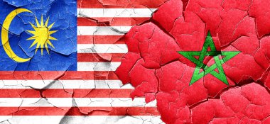 Malezya bayrağı bir grunge Fas bayrağı ile duvar kırık