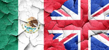 Meksika bayrağı bir grunge Büyük Britanya bayrağı ile duvar kırık