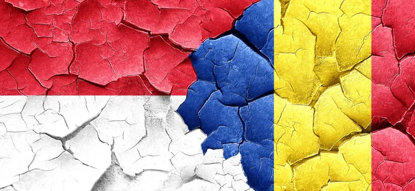 グランジのルーマニアの国旗とモナコの国旗ひびの入った壁 — ストック写真