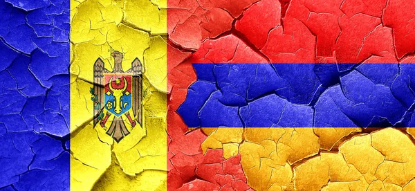 Moldova flag with Armenia flag on a grunge cracked wall — Stock Photo, Image